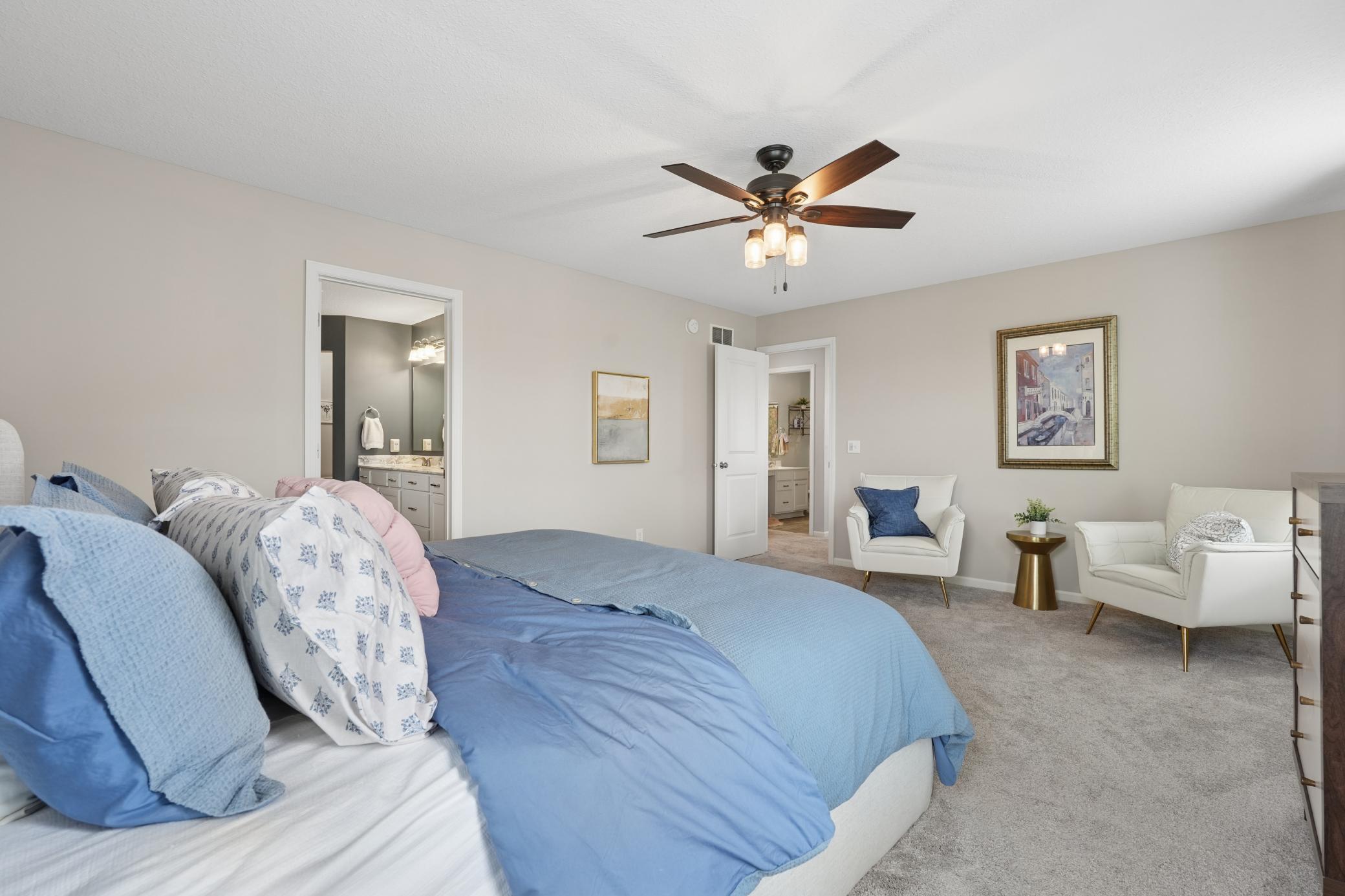 Reverse view of upstairs primary bedroom ensuite with sitting area