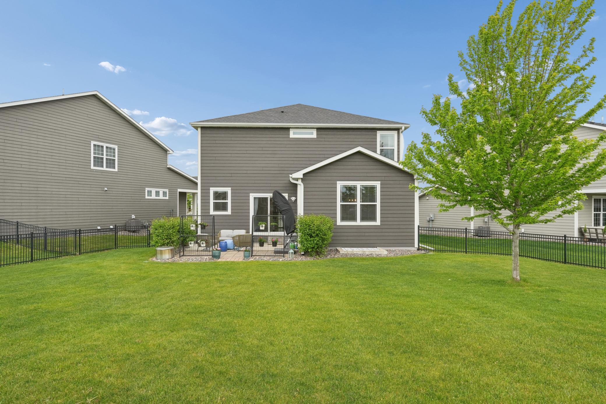 Back view of home and patio