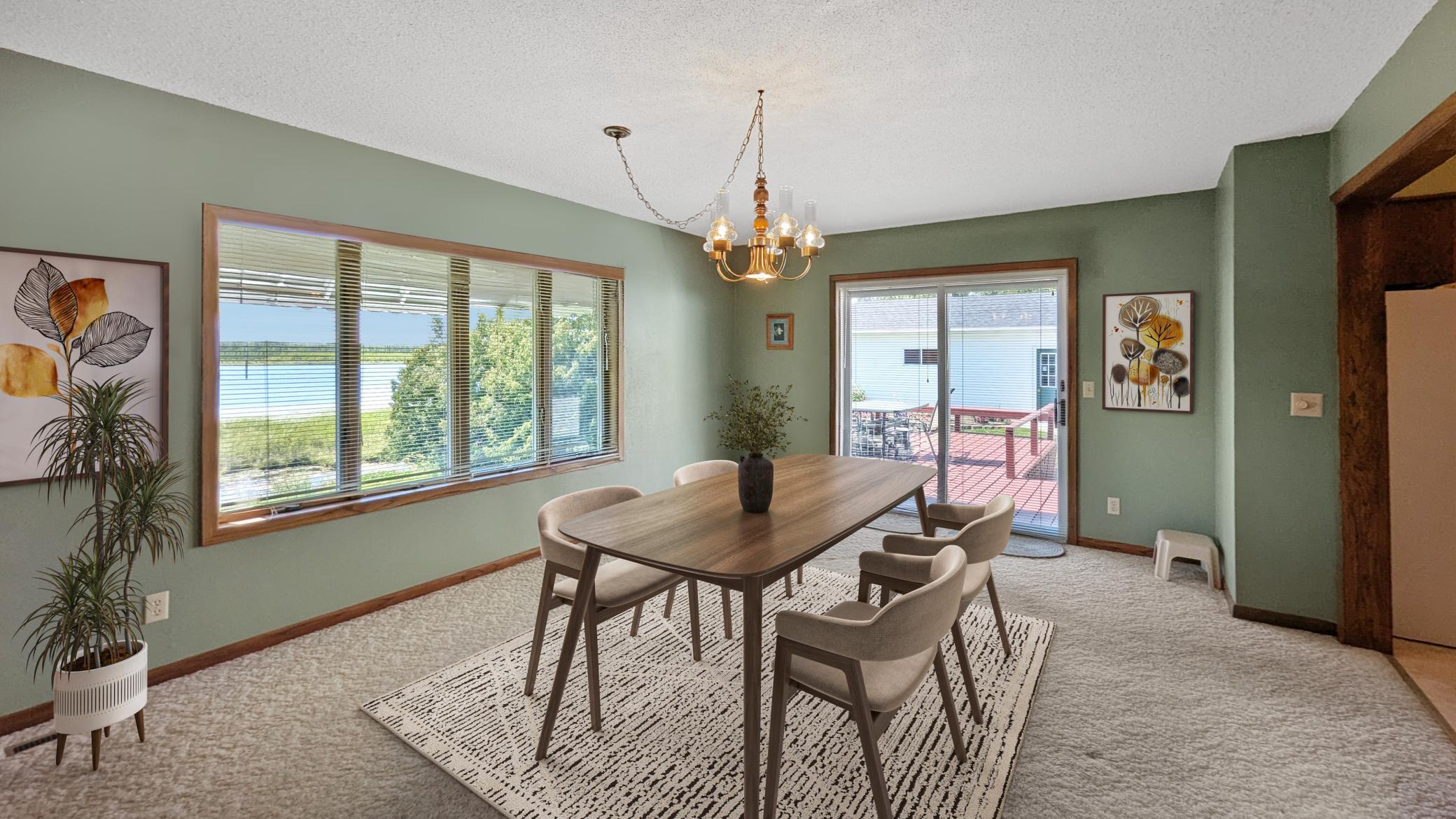 The large formal dining room offers views of the lake. Virtually Staged