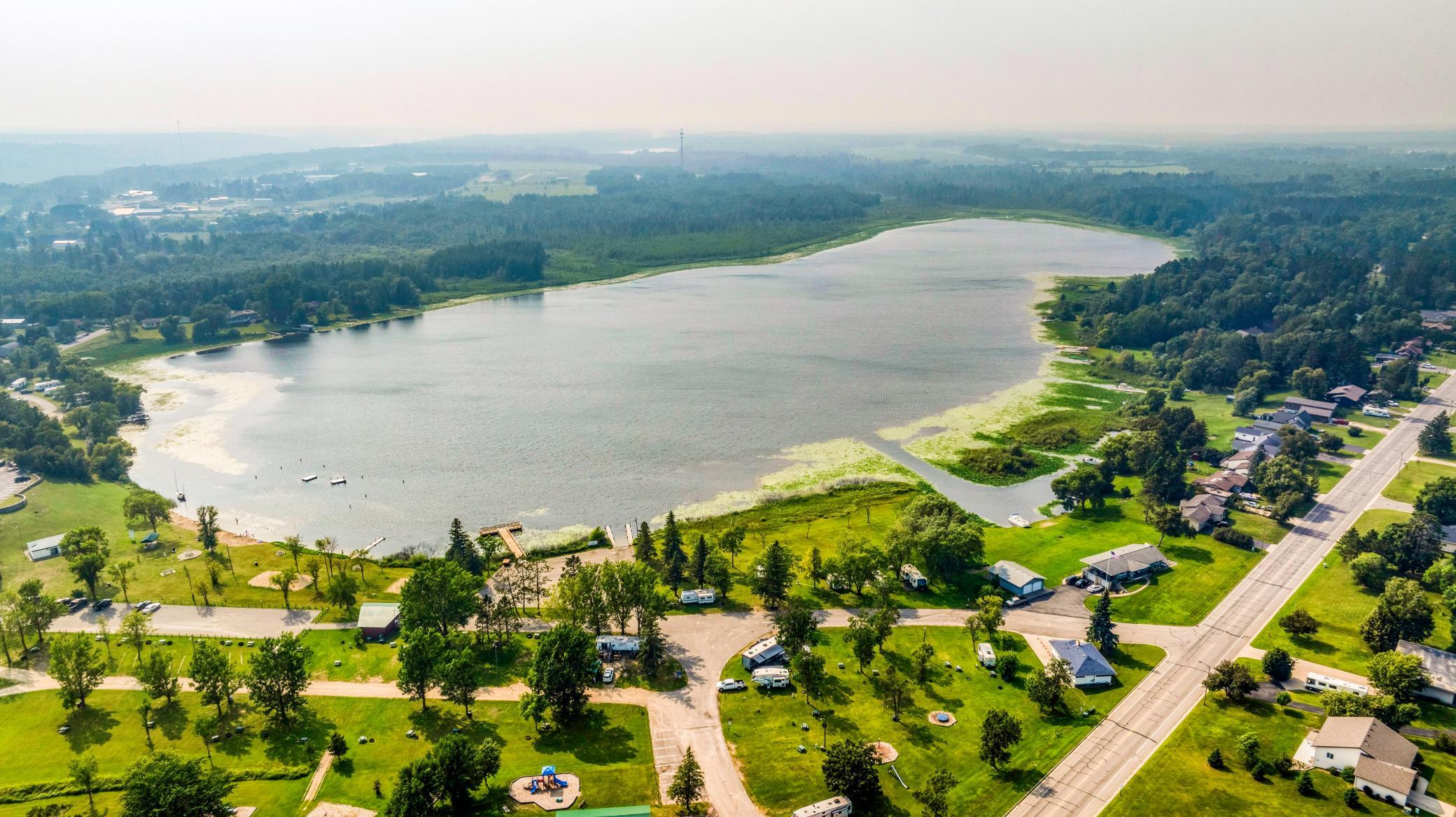 Short walk to the sandy swimming beach, fishing pier and more at the Bagley City park.