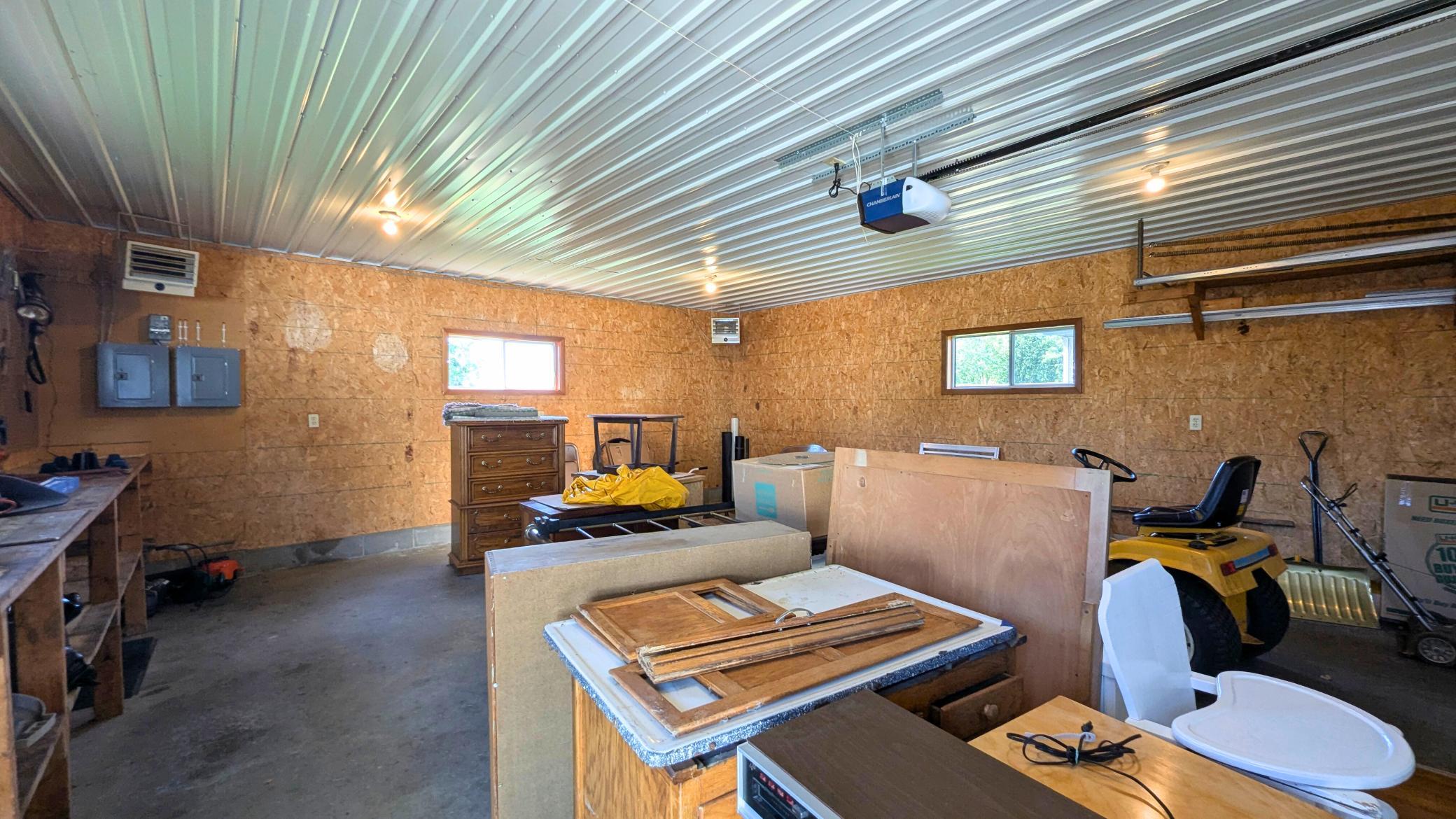 The detached insulated garage is heated for your toys and hobbies.
