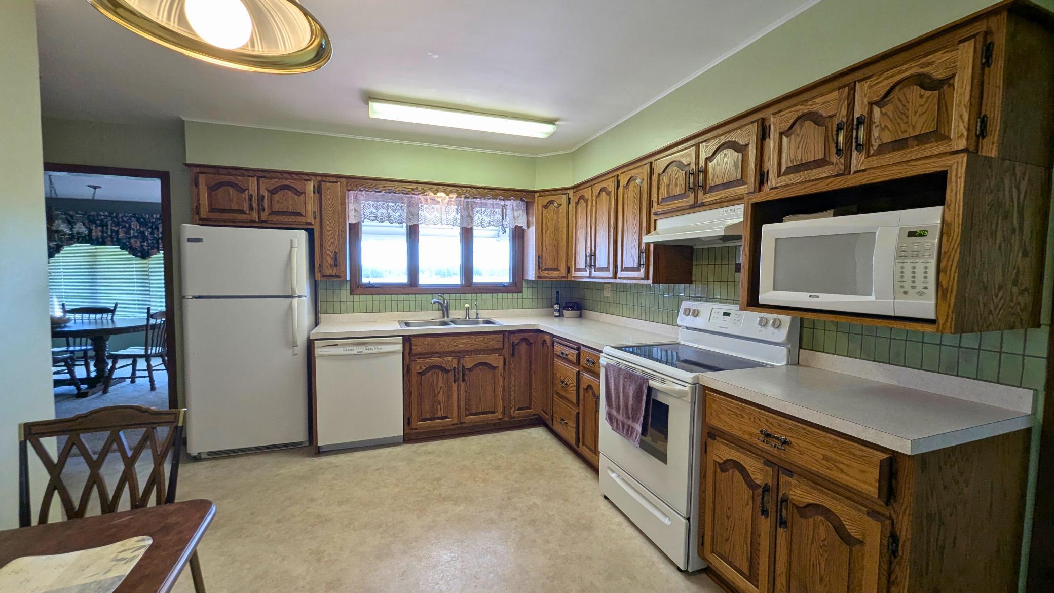 large kitchen with ample cupboards