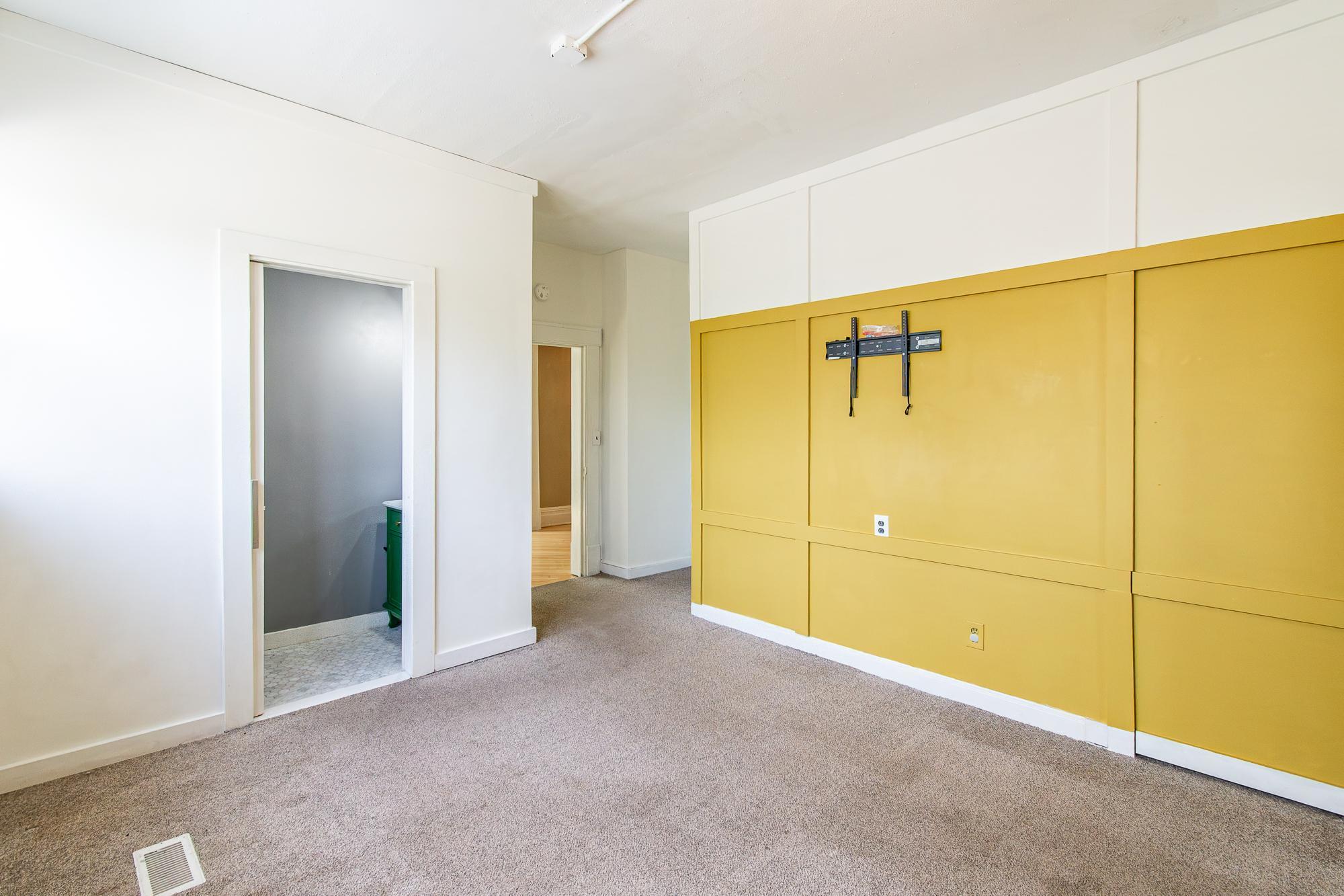 Main floor room w/ bathroom