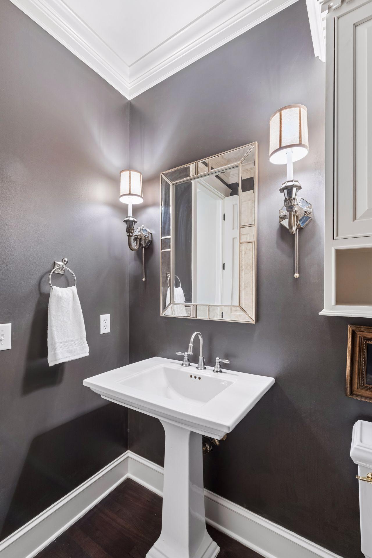 One of 2 main floor powder rooms