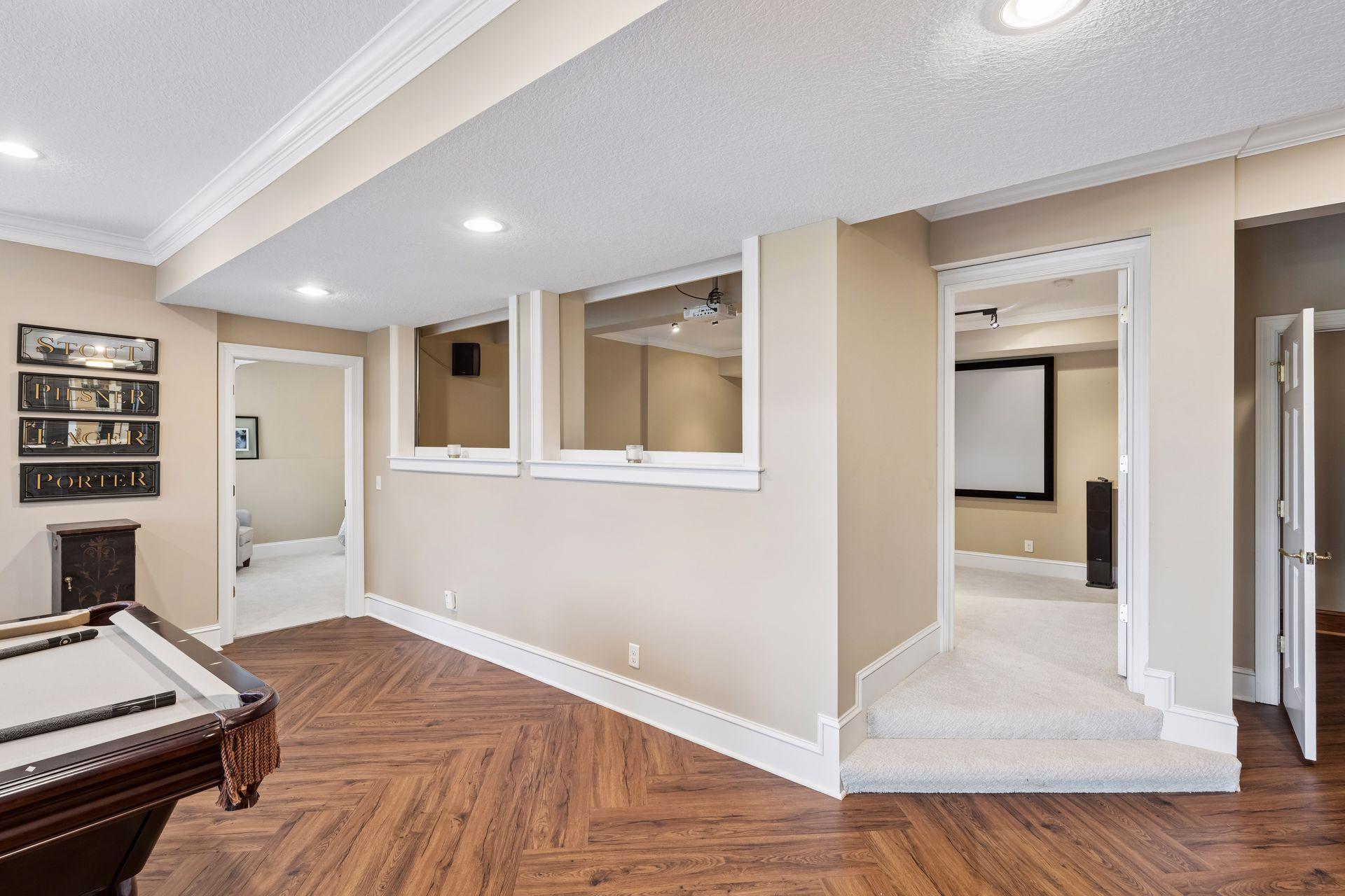 The updated Home Theater room has an electric wall for better sound and additional privacy
