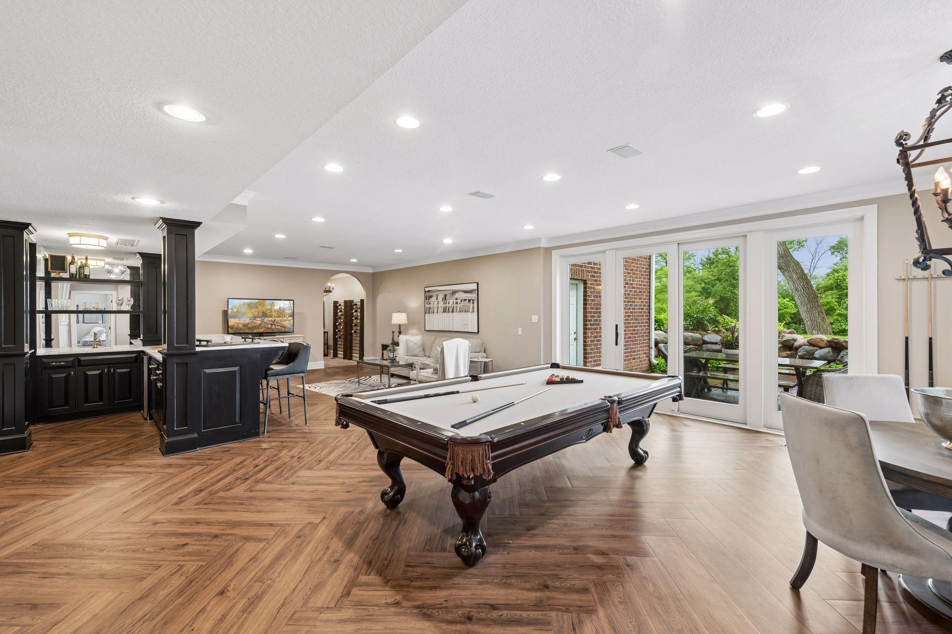The totally renovated Walk Out lower level is everything you could want for family and friends to enjoy