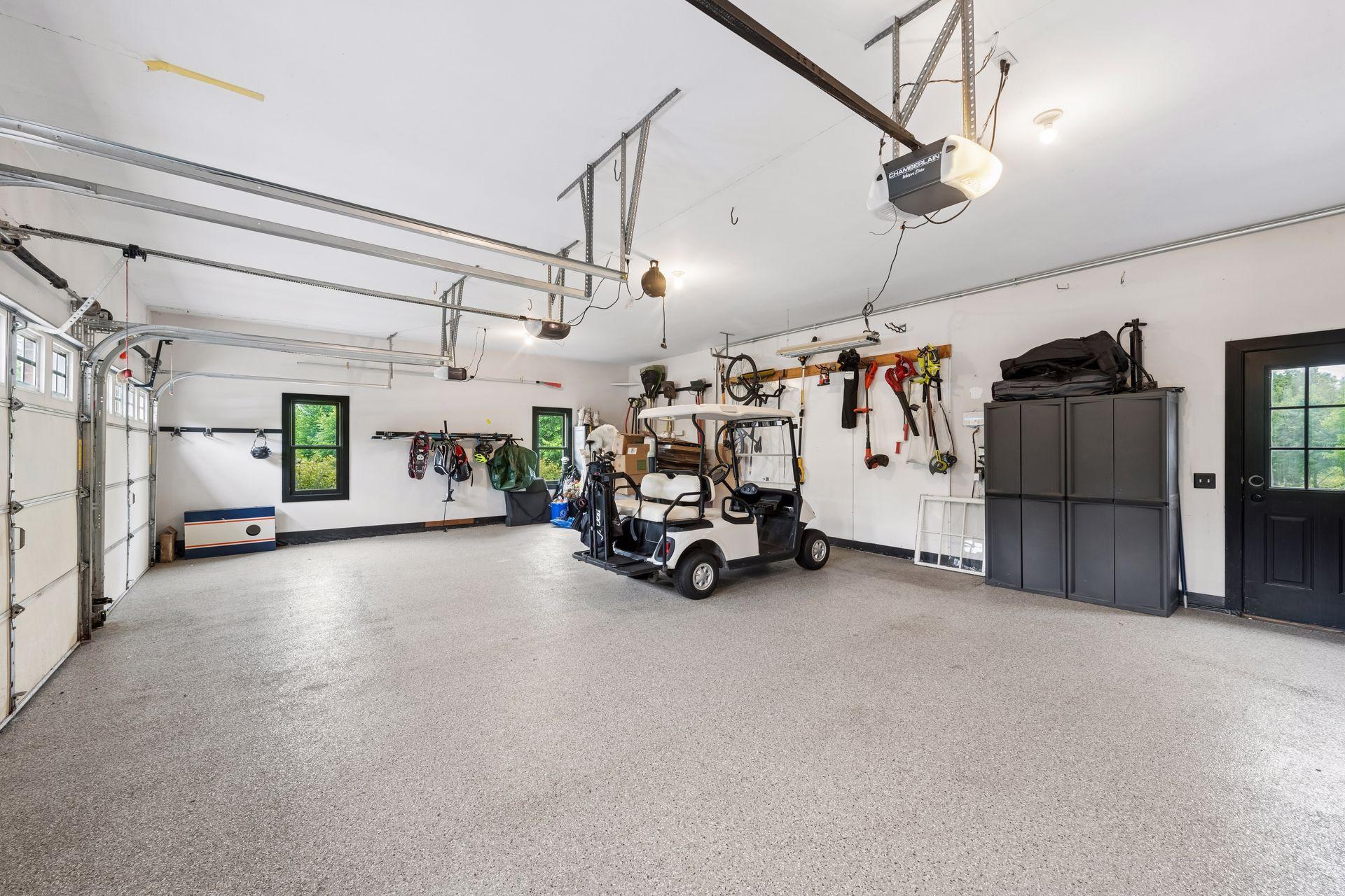 The oversized garage has room for everything you need, including your golf cart