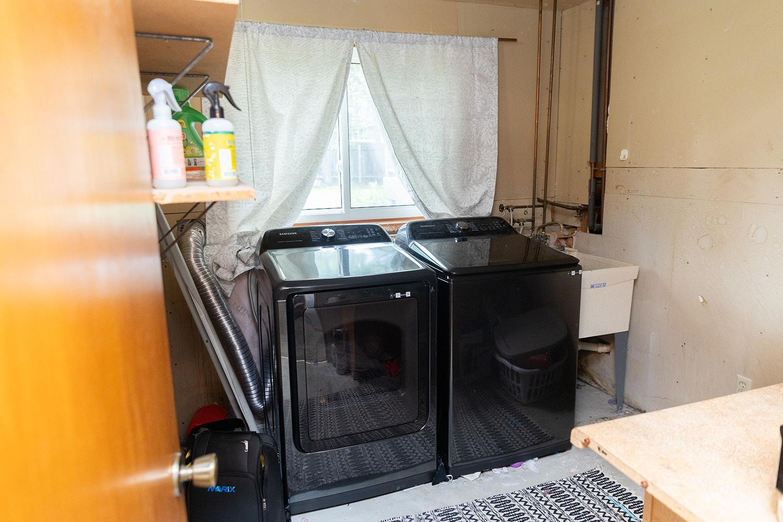 Laundry room overlooks backyard