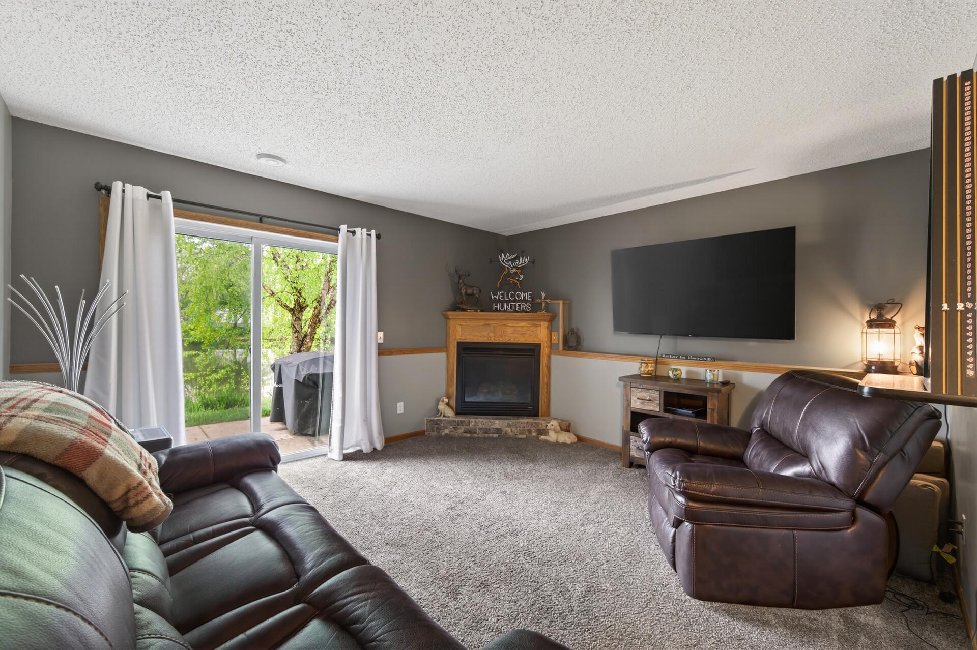 Family room on lower level with a walkout to patio.
