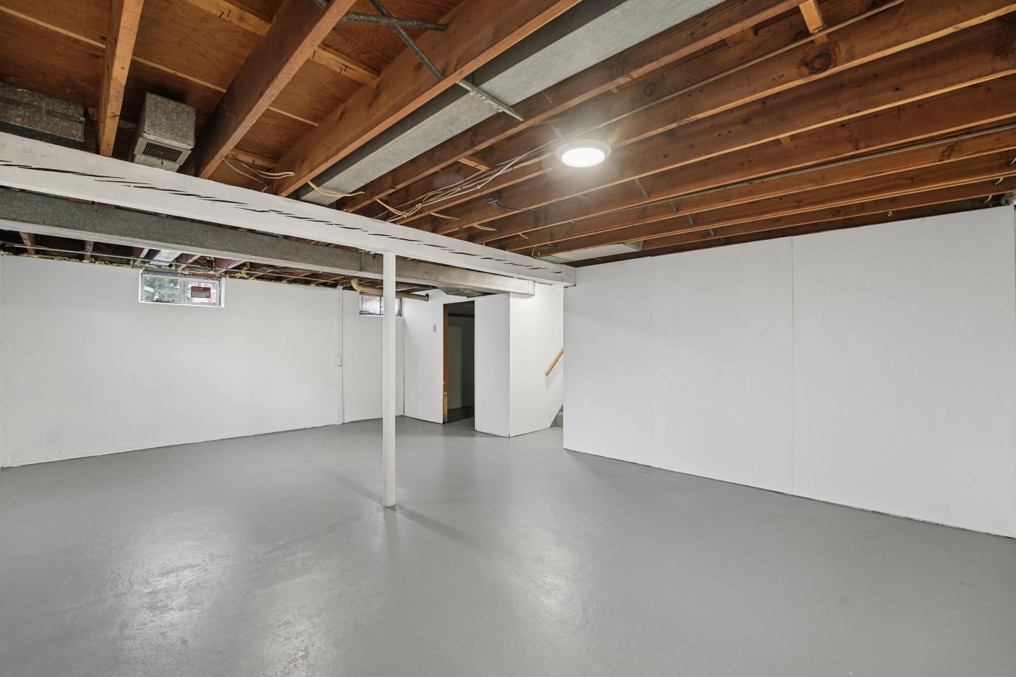 Lower level offers tons of storage space and is plumbed for an additional shower, offering great future potential.