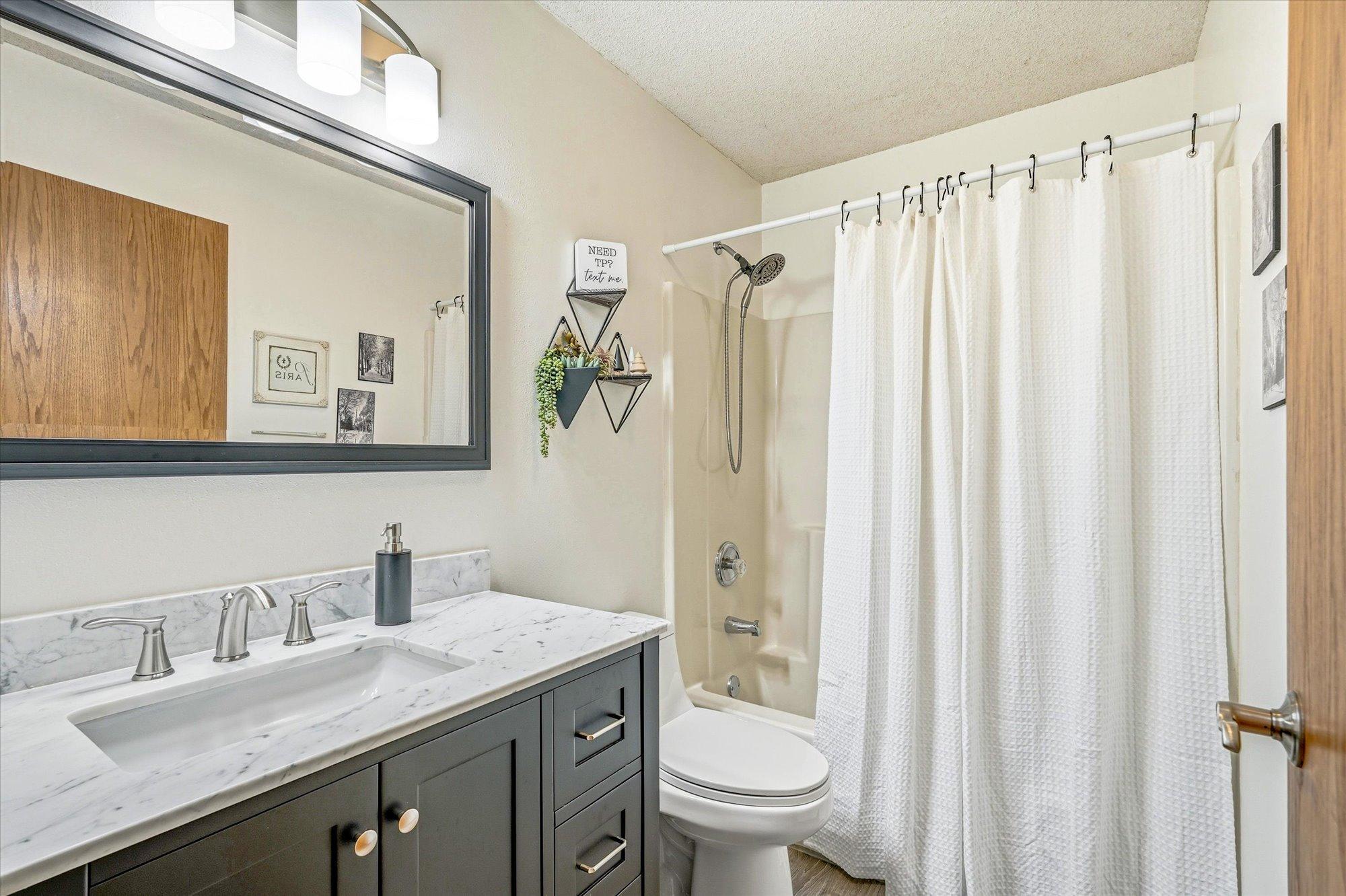 Updated main floor full bathroom.