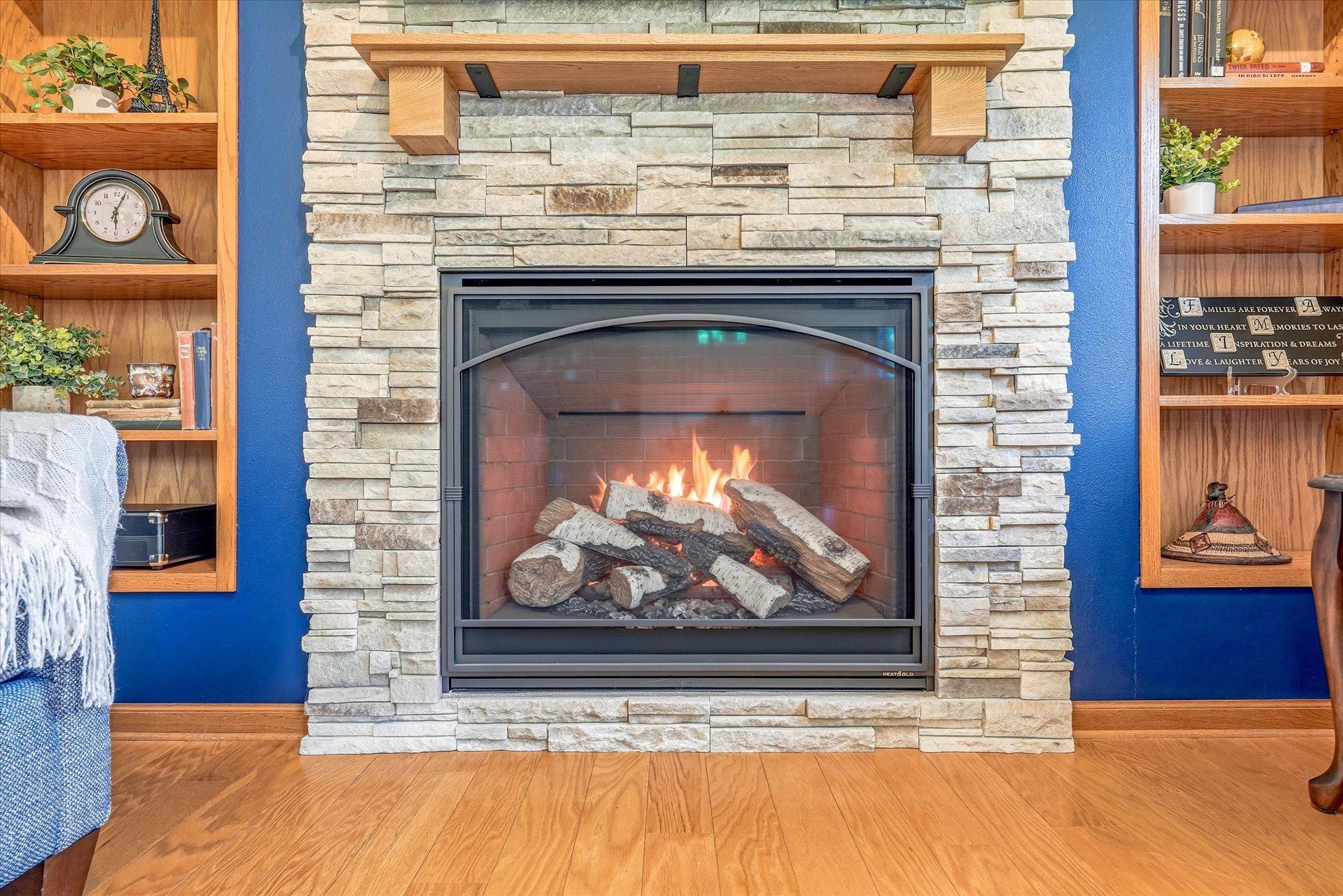 Beautiful newer fireplace.