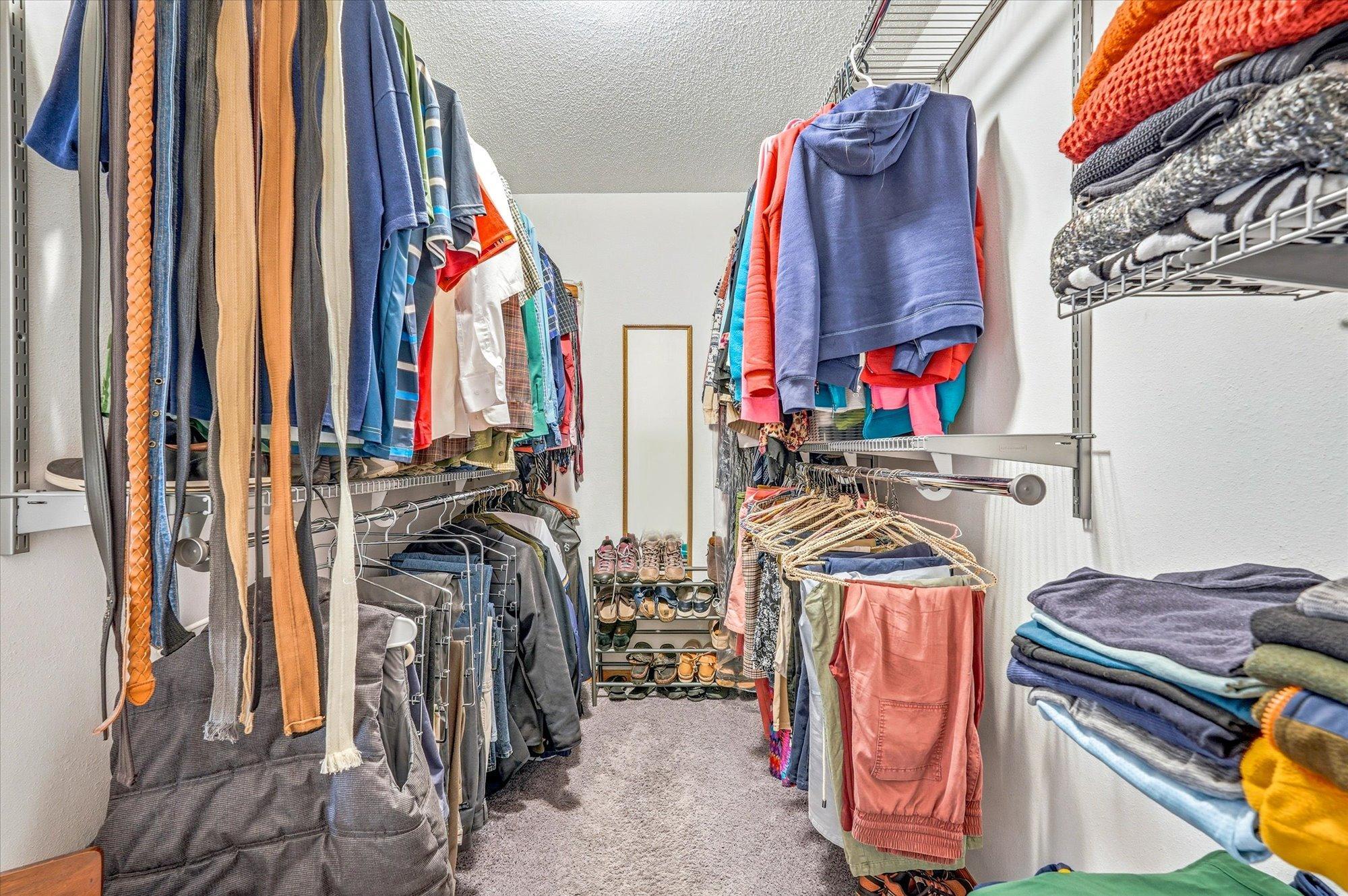 Primary walk-in closet.