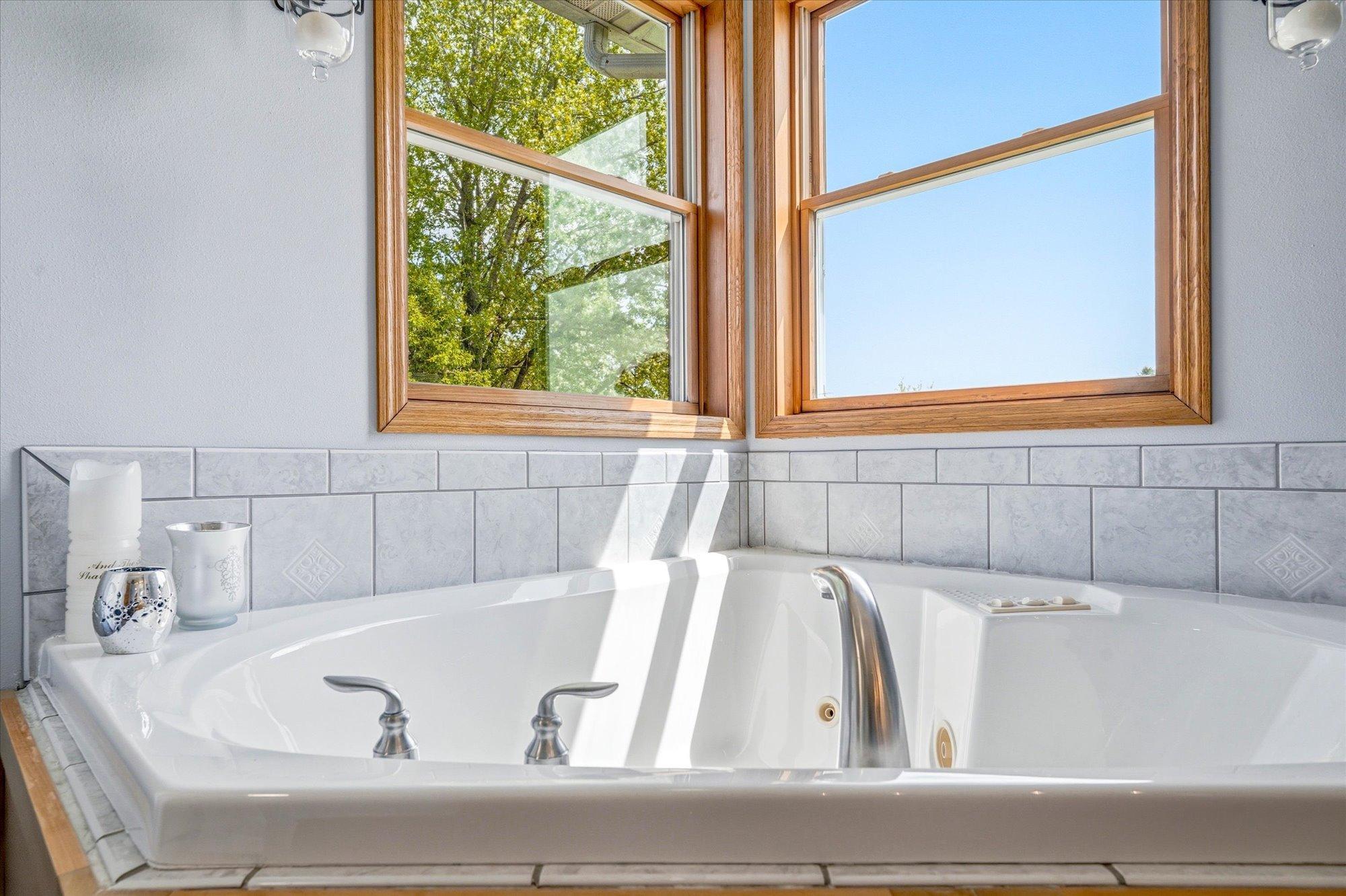 Separate jetted tub-primary.