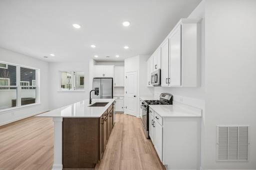 Plan your favorite meals in this well lit work space. A picture of a completed Crestwood home.