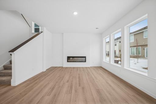9' ceilings and oversized windows offer natural light through out! A picture of a completed Crestwood home.