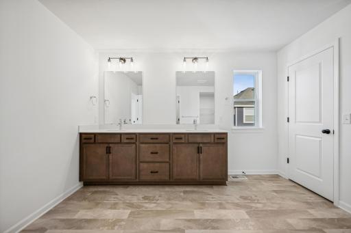 Owner's bath. A picture of a completed Crestwood home.