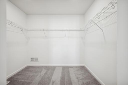 The spacious owner's closet! A picture of a completed Crestwood home.