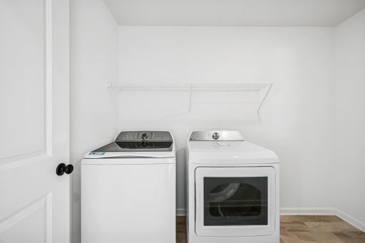 Laundry / utility room on the 2nd floor. A picture of a completed Crestwood home.