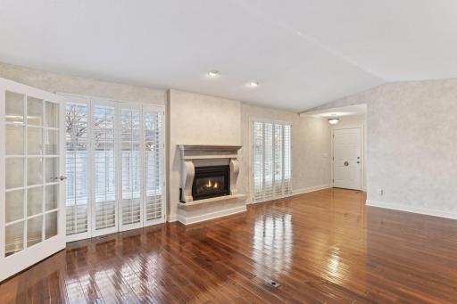 The living room windows have 3 inch plantation shutters for privacy.