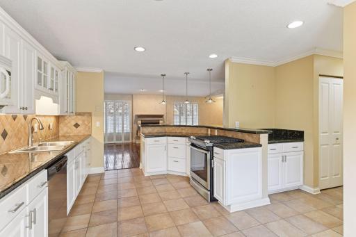 The kitchen has been opened to the living room and dining room.