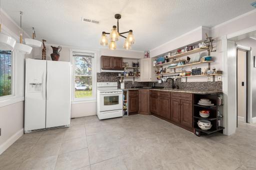 Features Updated Cabinets & Granite Countertops