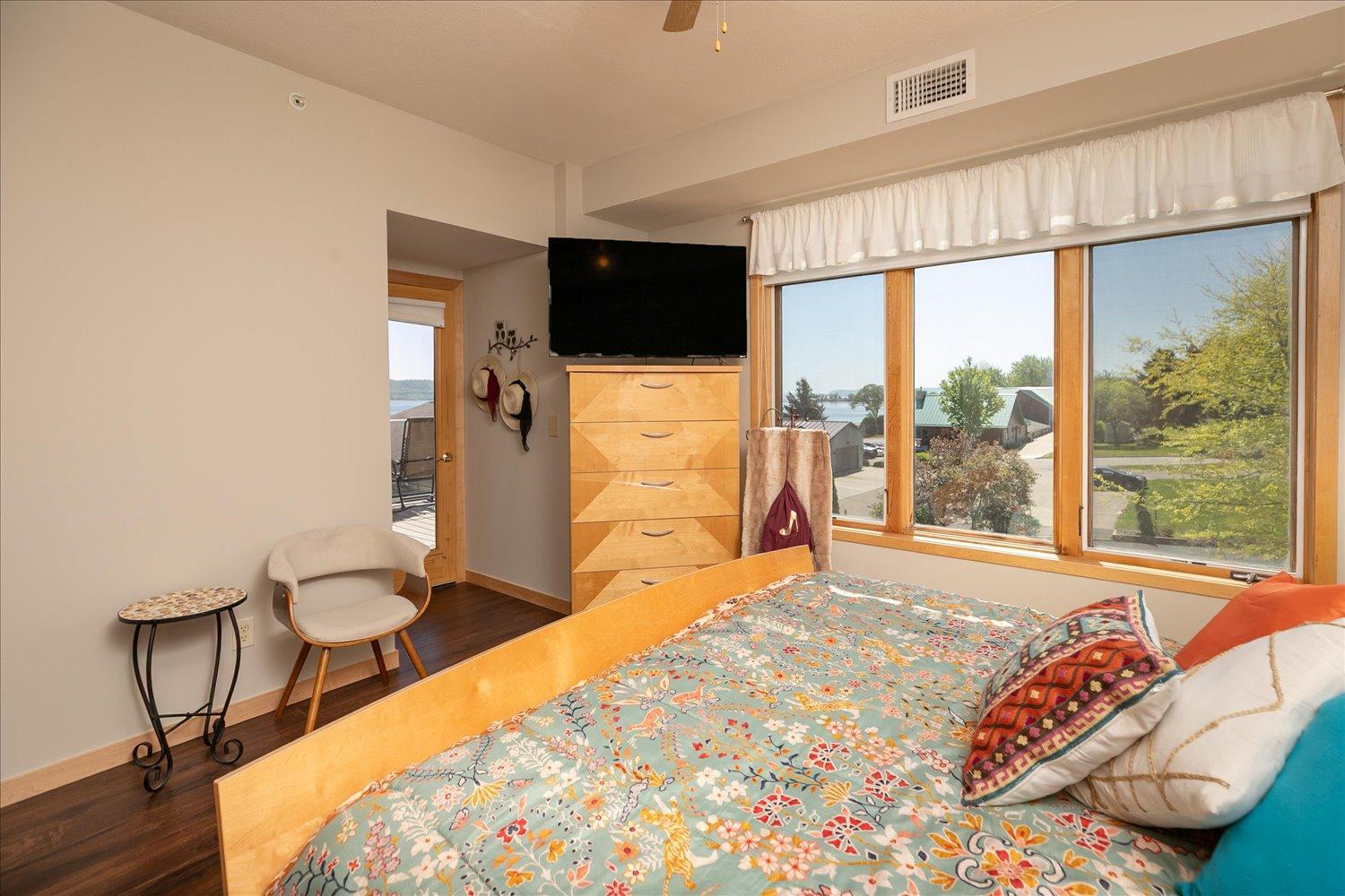 16x19 Master Bedroom with balcony access22-22-Primary Bedroom.jpg