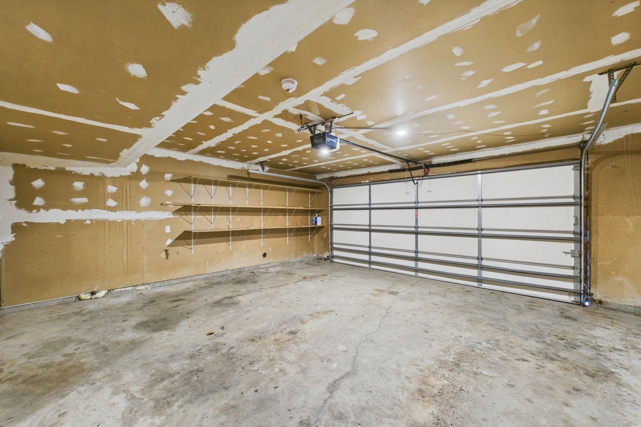 Lg garage with storage room