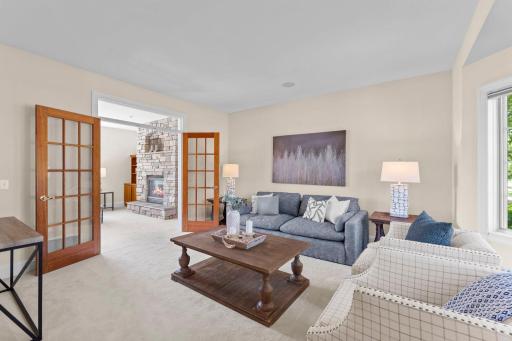 French doors off the living room open into the family room.