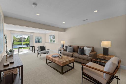 The finished walkout lower level features a spacious family and recreation area.