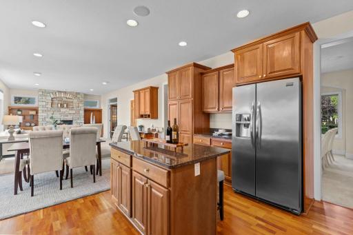 The kitchen flows seamlessly into the informal dining area.