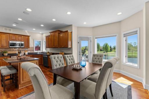 The dining room is perfect for everyday meals, with direct access to a maintenance-free deck.