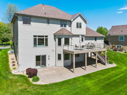 Whether relaxing on the spacious deck or patio, youâll appreciate the lush, green lawn maintained by an in-ground irrigation system.