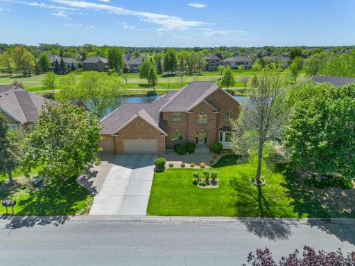 Welcome to this stunning five-bedroom, four-bathroom home located on the TPC golf course in the highly sought-after Deaconâs Walk community in Blaine.