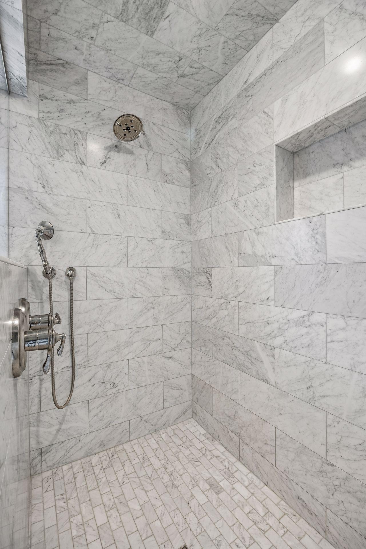 Large walk-in shower in the primary bathroom. It was retiled in 2019!