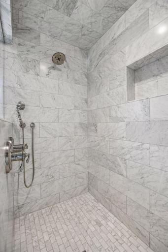 Large walk-in shower in the primary bathroom. It was retiled in 2019!