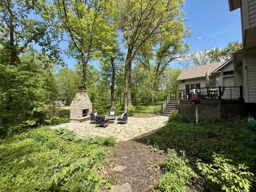 Another angle of the outdoor fireplace and the deck.