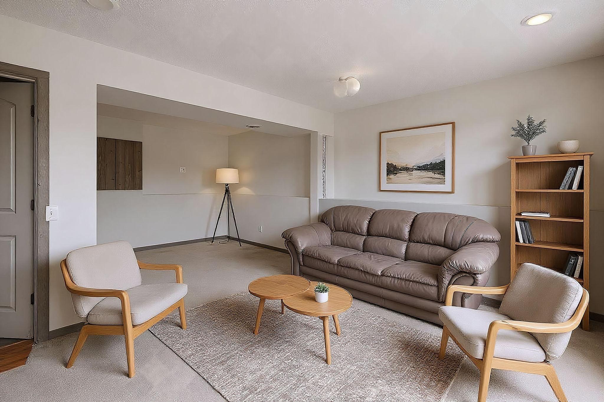 Spacious lower level 2nd family room has been virtually staged
