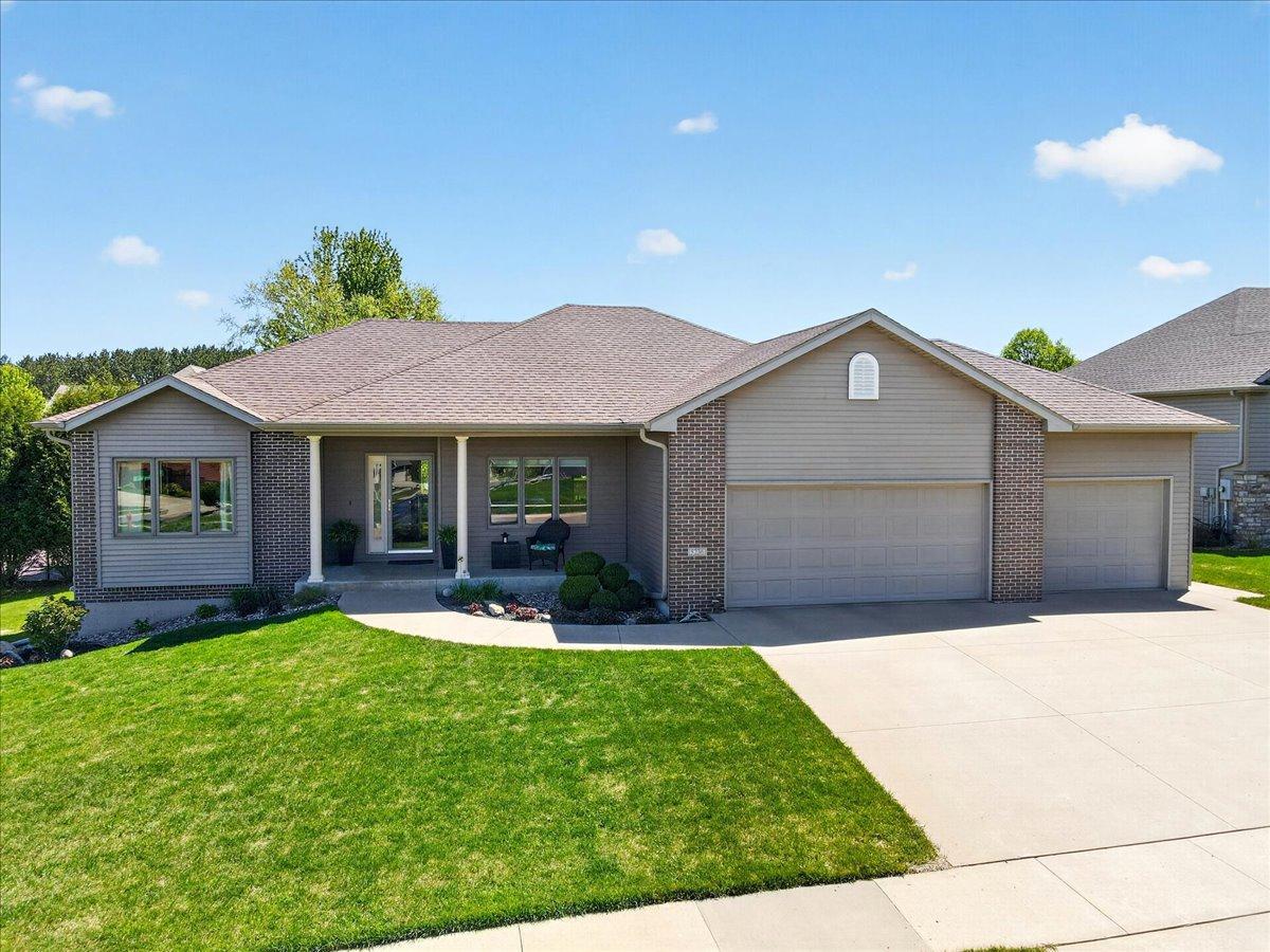 Custom built 3 bedroom, 3 Bath home; Deck with custom retractable awning and lower level paver patio with cabana-style gazebo. In-ground lawn irrigation