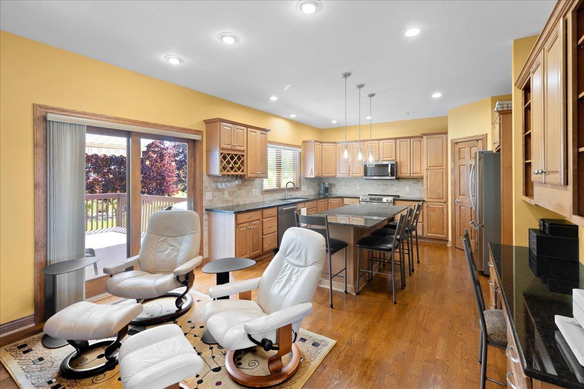 Cozy up in the Hearth Room or utilize this space for an informal dining room
