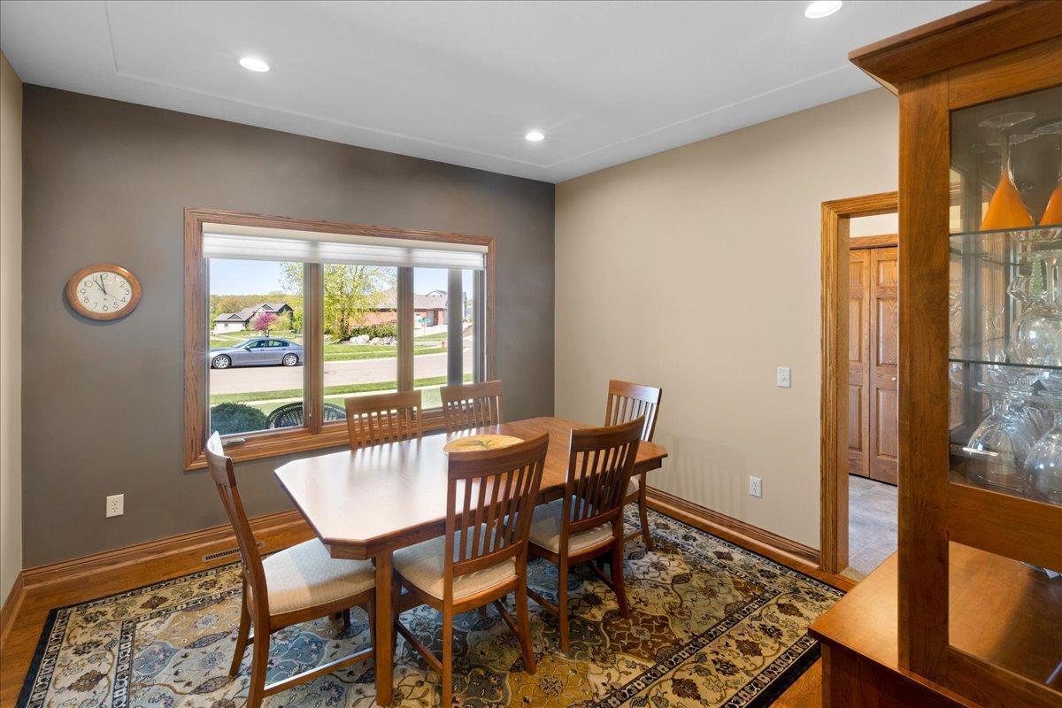 Formal Dining room with hardwood floors; racetrack ceiling