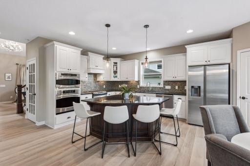 Large center island with additional seating.