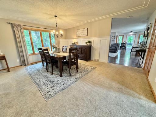 Dining room offers Wainscotting wall feature