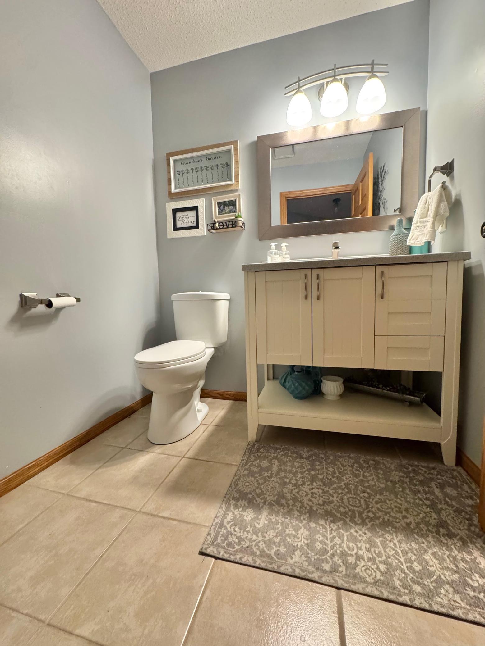 Bath main floor off back foyer
