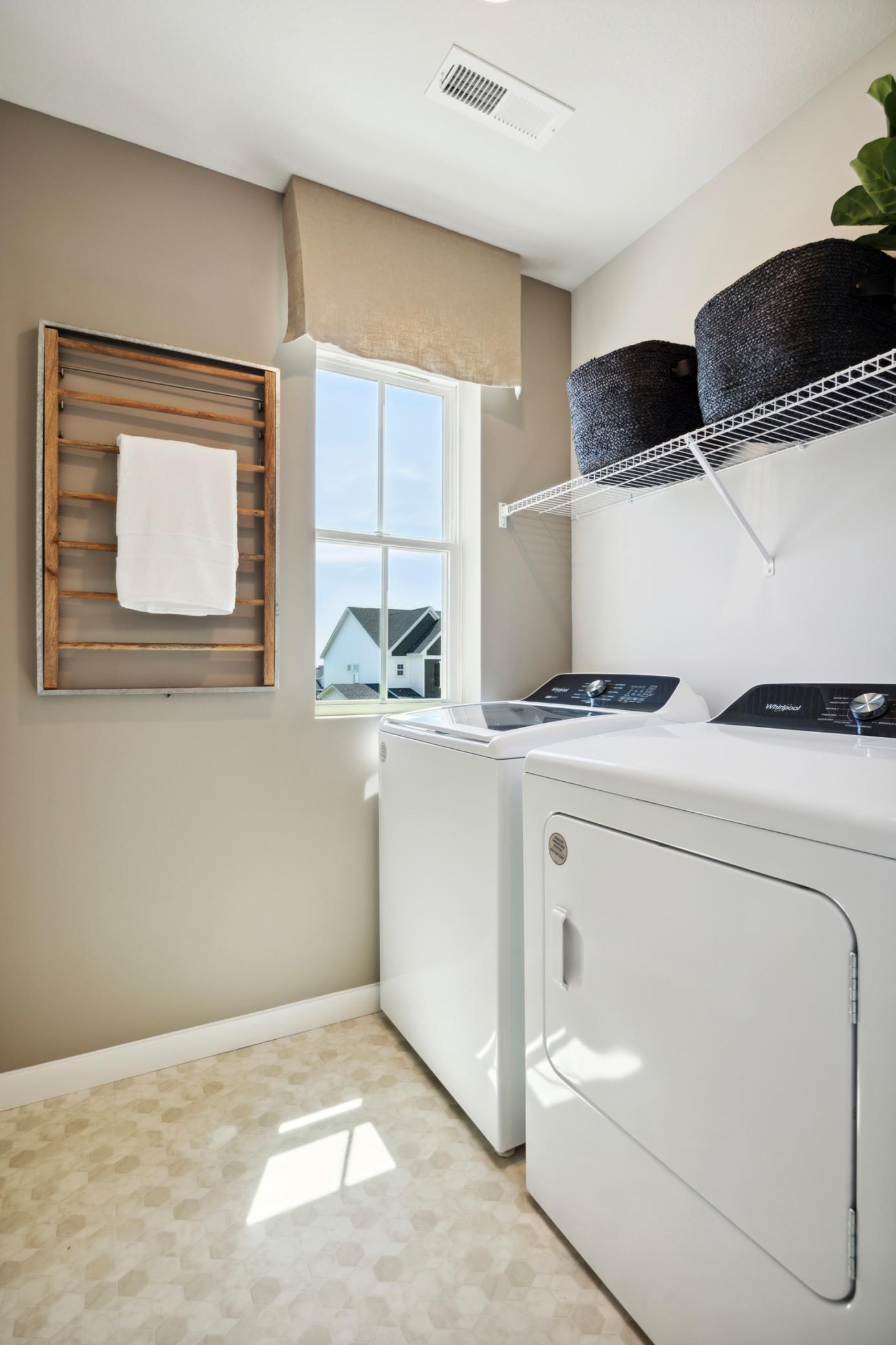 Durable flooring and bright lighting create a clean, functional workspace that feels just as thoughtfully designed as the rest of the home.