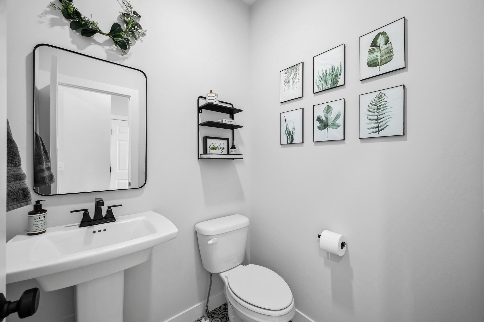 Powder room on the main level, nice option for your guests!