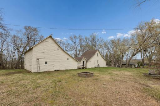 Excellent Outbuildings Including a Chicken Coop, Shop, Garage, and More