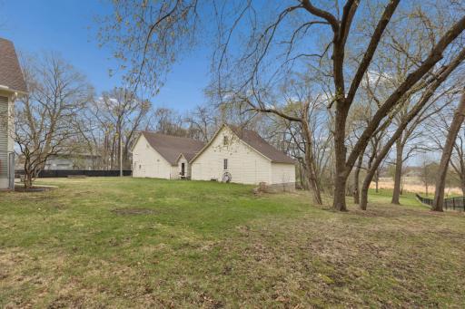 Excellent Outbuildings Including a Chicken Coop, Shop, Garage, and More