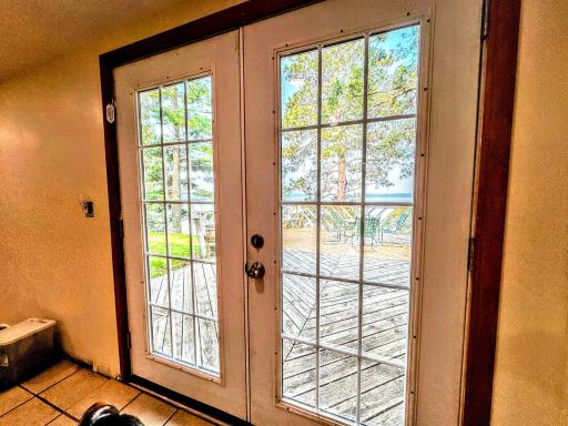 Looking out the door off of the dining room with direct views of the lake.jpg