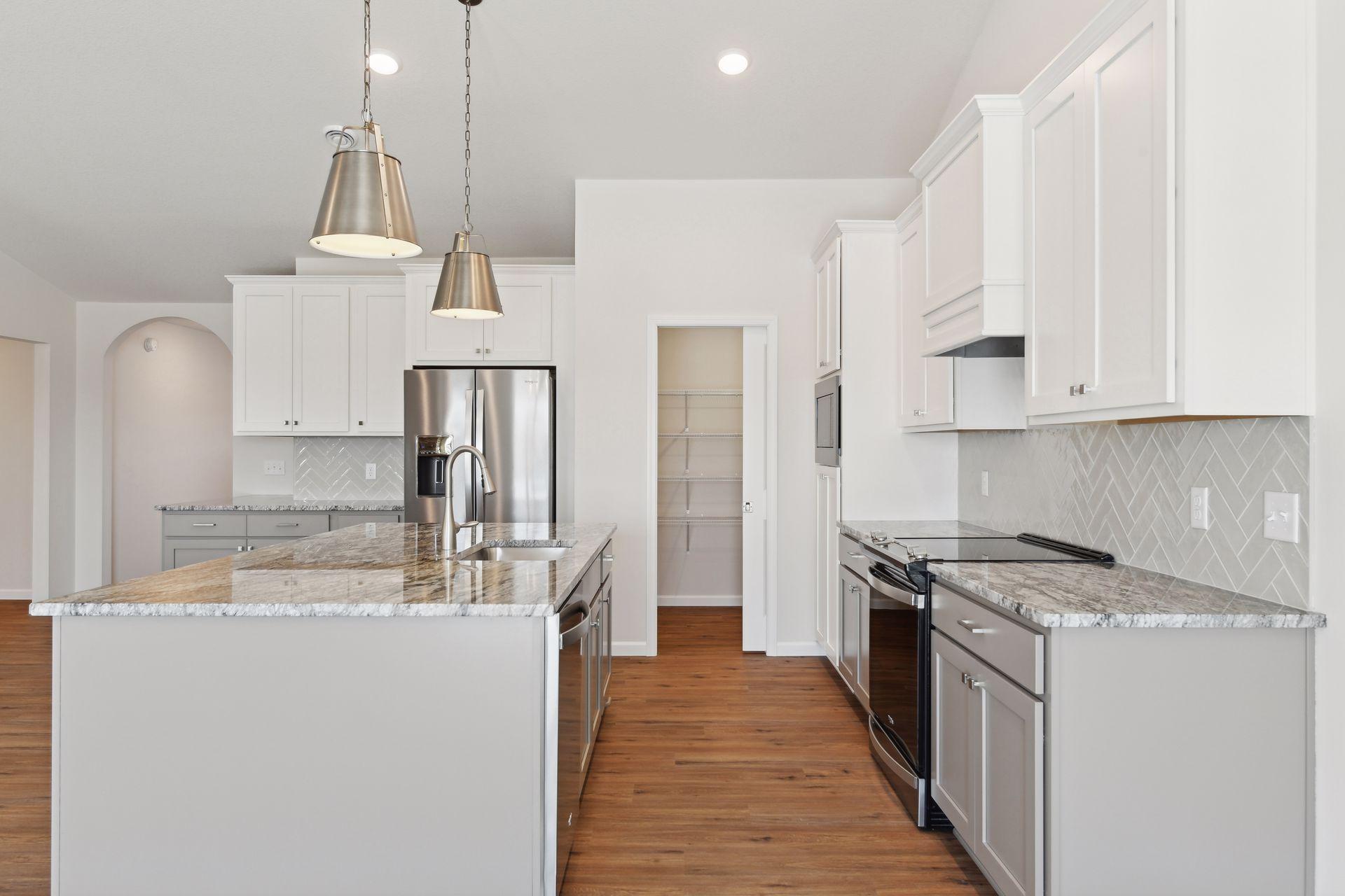 Photo is of a different home (same model) - colors and selections may vary.